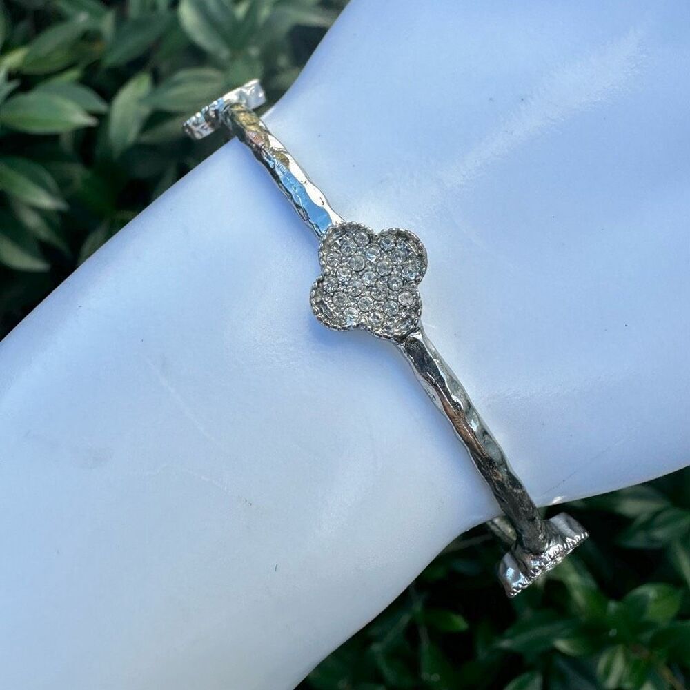 Silver tone clover bangle bracelet